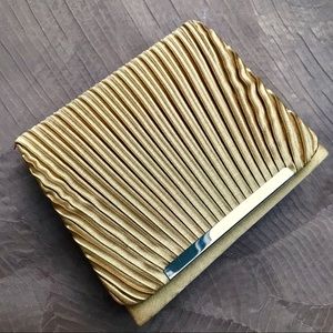 Gold “Deco” designed evening bag.